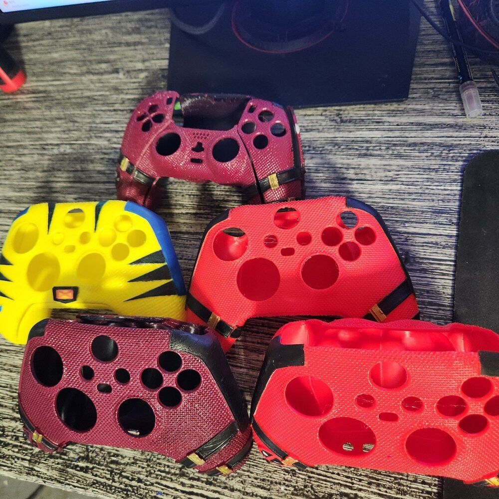 1 Deadpool Controller and 1 wolverine controller cover bundles.